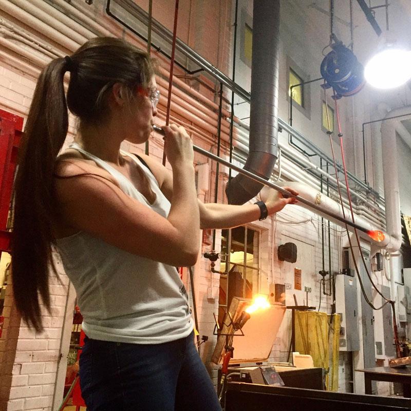 Natalie Turco blowing glass